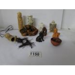 A mixed lot of oriental perfume bottles,