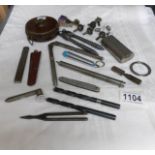 A quantity of small tools, tape, gauges,
