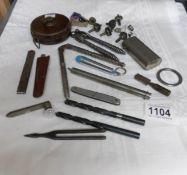 A quantity of small tools, tape, gauges,