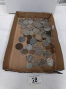 A tray of GB and foreign coins