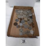 A tray of GB and foreign coins