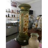 A 19th century Buemantofts pottery jardiniere stand with sunflower design,