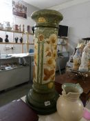 A 19th century Buemantofts pottery jardiniere stand with sunflower design,