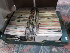 A large box of 45 rpm records