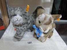 A Steiff 'Putsi' rabbit and a Steiff Whiskas cat