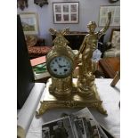 A gilded spelter French mantel clock