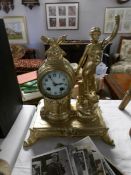 A gilded spelter French mantel clock