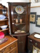 A 1930's corner cabinet