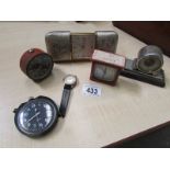 A quantity of travel clocks etc