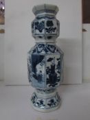 A circa 17th century blue and white vase with depictions of character and objects (top repaired),