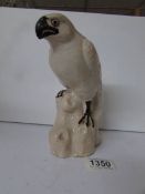 A ceramic parrot