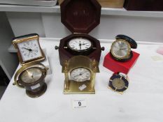 4 Swiza clocks including boxed Bulova ship's gimbal clock and a travel clock