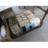 A large box of 45 rpm records