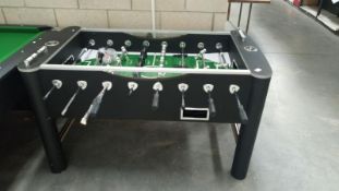 A large table football game (legs A/F)