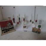 12 items of building themed Goss crested china including lighthouses, Westminster Abbey,