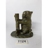 A 19th century bronze bear inkwell in match striker with glass eyes,