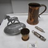A mixed lot being 2 whistles, a cast ashtray,
