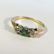 A 9ct gold ring set with 3 stones