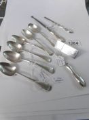 A mixed lot of silver spoons, button hook,