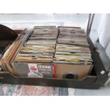 A large box of 45 rpm records