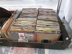 A large box of 45 rpm records