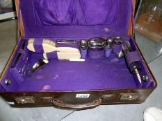 A ladies vanity case with contents and key (key in office)