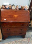 An Edwardian mahogany inlaid bureau