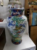 A large hand painted oriental vase,