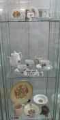 A collection of commemorative china and a crown money box,