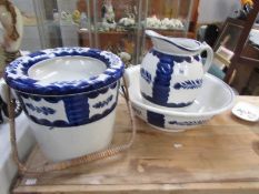 A ceramic toilet set comprising jug,