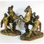 A pair of Victorian brass Marley horses