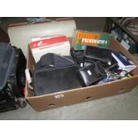 A box of photographic items including camera's