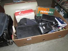 A box of photographic items including camera's