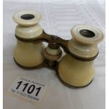 A pair of ivory covered opera glasses