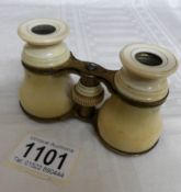 A pair of ivory covered opera glasses