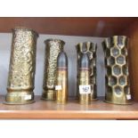 6 items of brass shell case trench art