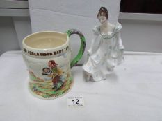 A Royal Doulton Minuet figurine and a Crown Devon 'On Ilkley Moor Baht at' musical tankard