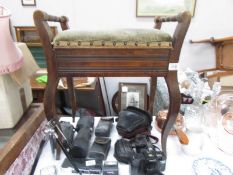 An Edwardian piano stool