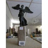 A 19th century bronze angel a/f (missing arm)