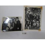 A signed photograph of The Beatles with signatures of John Lennon, Paul McCartney,