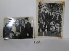 A signed photograph of The Beatles with signatures of John Lennon, Paul McCartney,