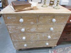 A 2 over 3 pine chest of drawers