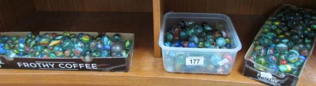 3 boxes of glass marbles