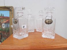 4 cut glass decanters