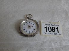 A ladies silver fob watch with enamel dial,