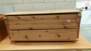 A pine back to front drawer ottoman