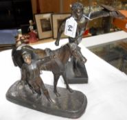 2 spelter figures being a horse and jockey and a Greek warrior,