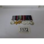 A set of 6 miniature medals including George VI distinguished flying medal