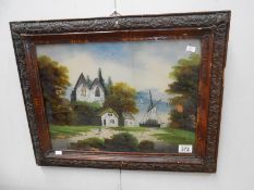 A framed and glazed country scene