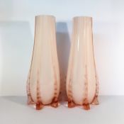 A pair of early 20th century pink glass vases